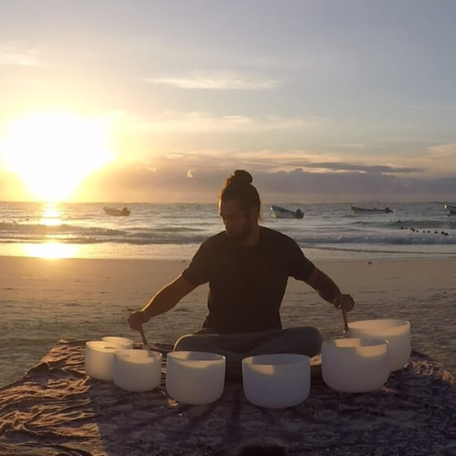 crystal bowls at sunrise, part of a sound healing session